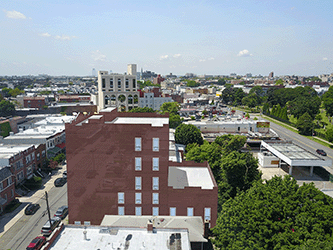 3d model of a proposed building placed in a drone image